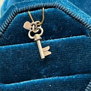 Antique 800/835 German Silver Key with Tiny Heart Charm- .4 Grams